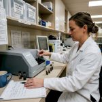 Lab technician preparing hair test samples