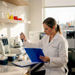 Lab technician performing hair drug test