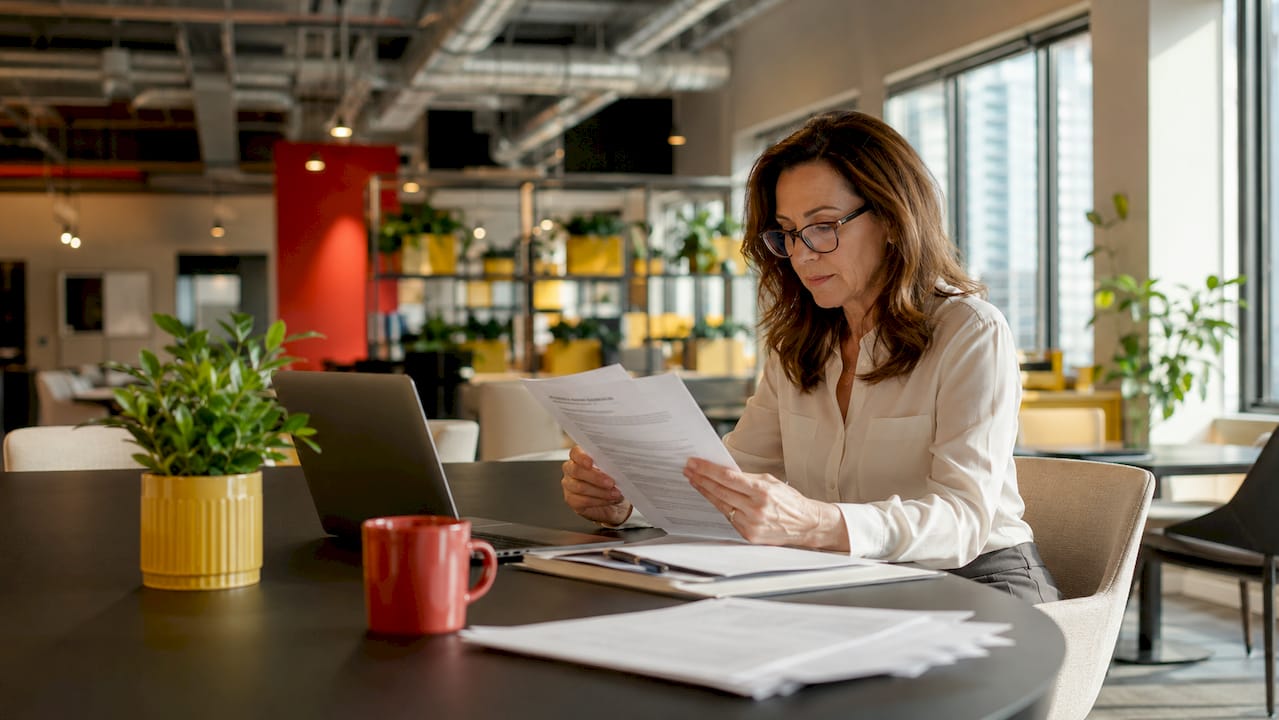 Woman reviewing drug testing policy documents
