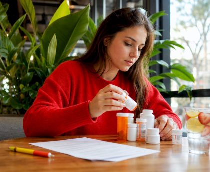 Person organizing medications before hair drug test