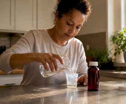 Person preparing urine sample for drug test