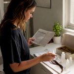 Person using hair drug test cleaning kit at kitchen table