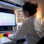 Analyst reviewing hair test laboratory results