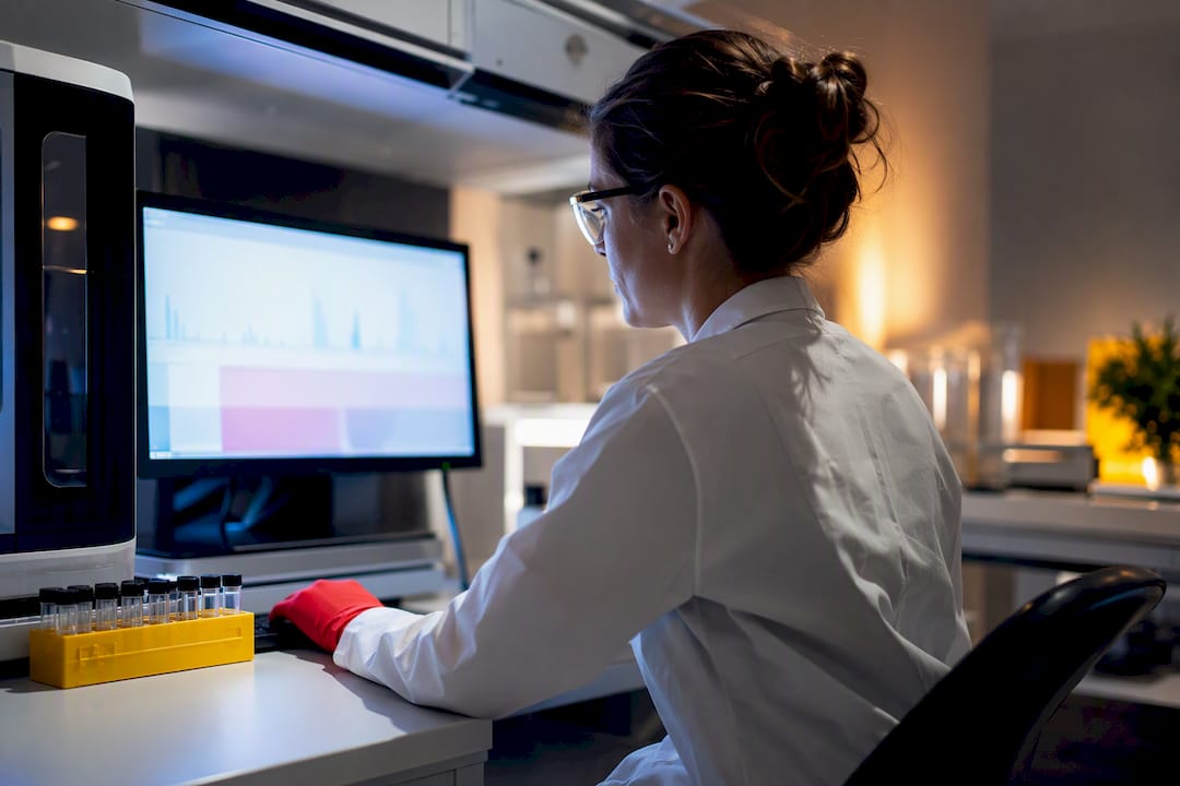 Analyst reviewing hair test laboratory results