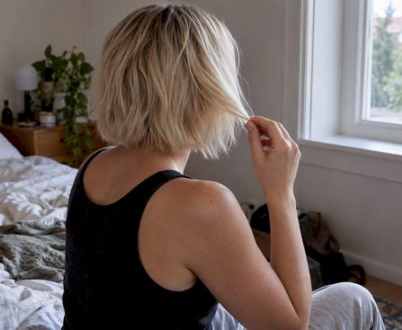 Woman resting freshly bleached hair before washing