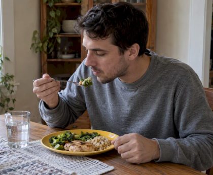 Adult eating an everyday meal at home