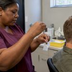 Technician bags a scalp hair sample